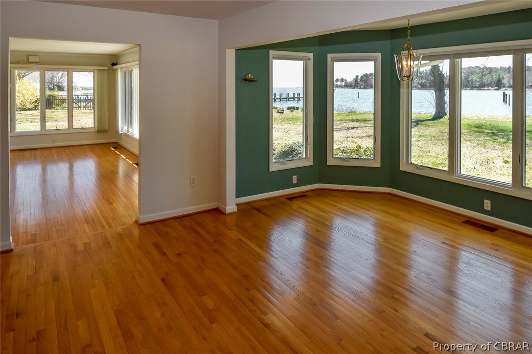 2058 Ditchley Road Kilmarnock, VA 22482 - Photo 9 of 22 DINING AREA LOOKING INTO THE LIVING ROOM