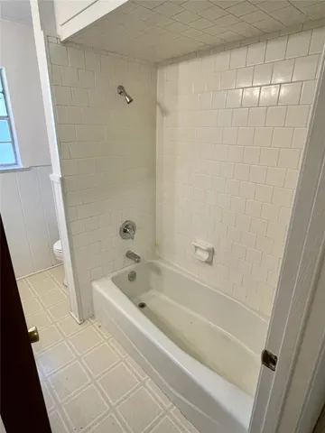 a bathroom with a bathtub