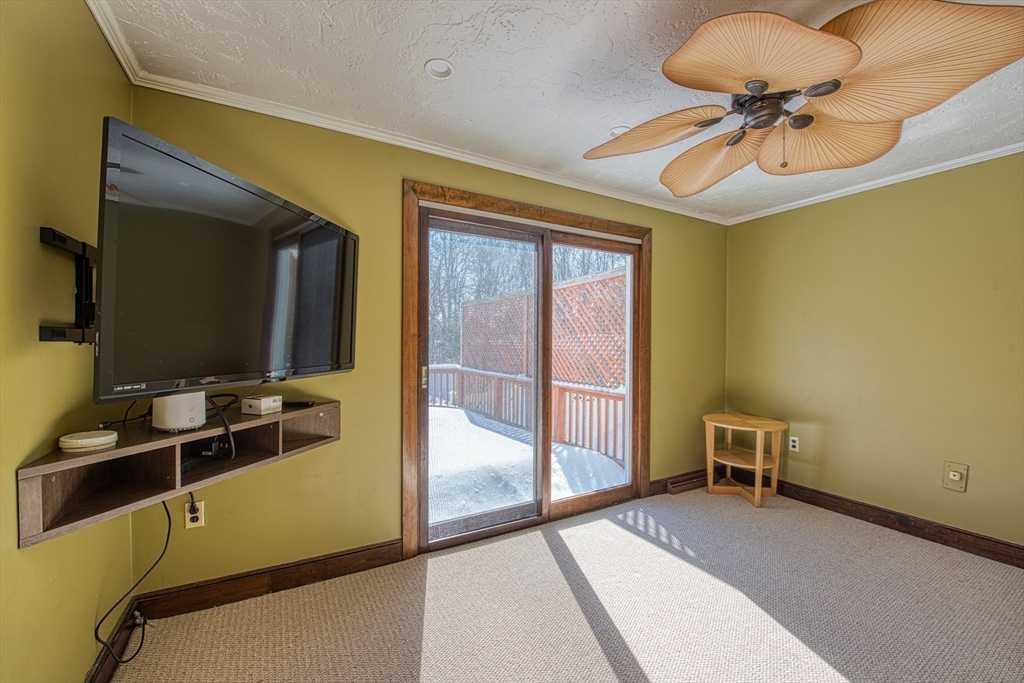 12 Brewster Road Randolph, MA 02368 - Photo 8 of 27 a view of a room with a flat screen tv