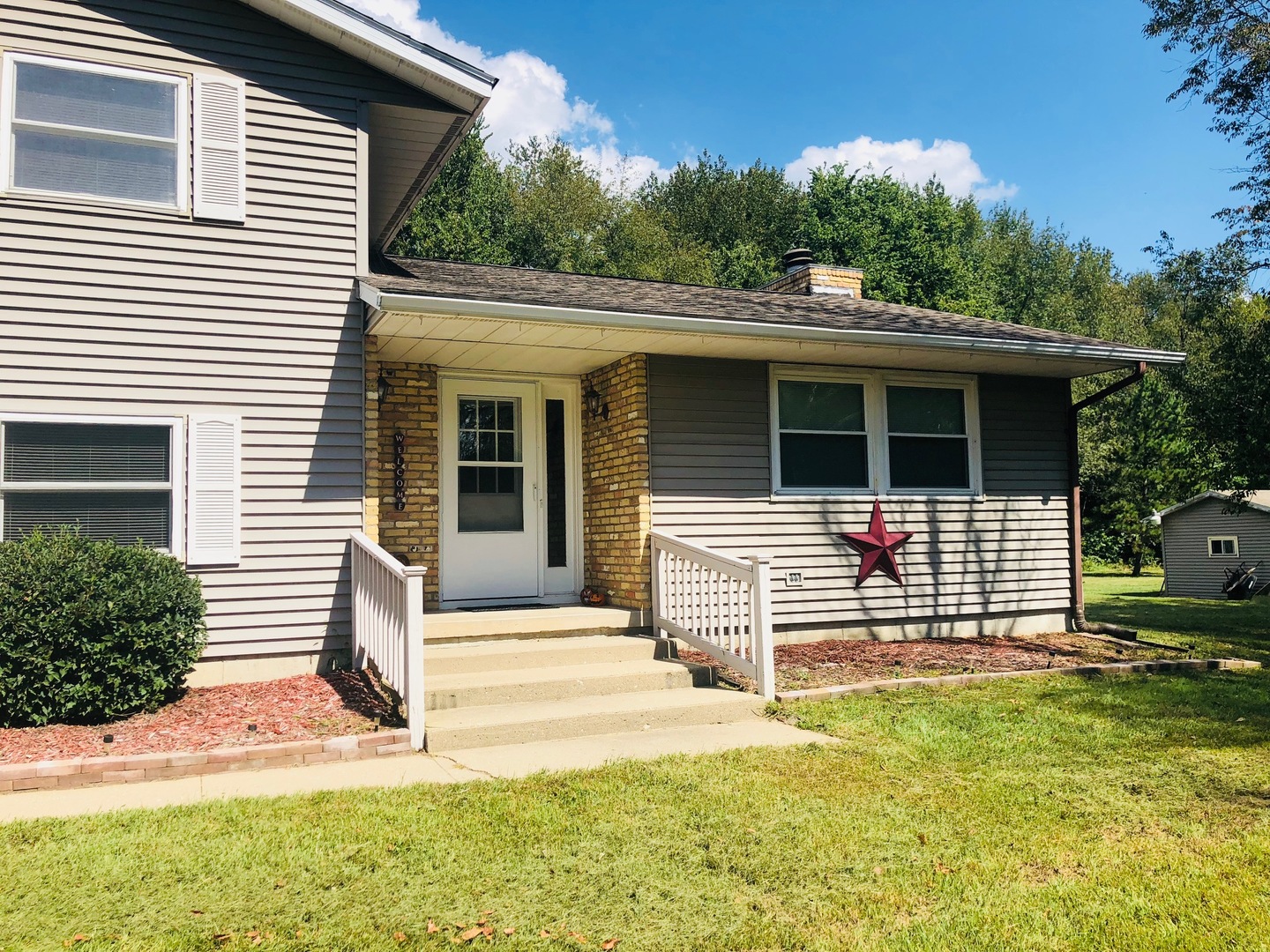 374 Rock Island Road Dixon, IL 61021 - Photo 16 of 20 a house with trees in the background