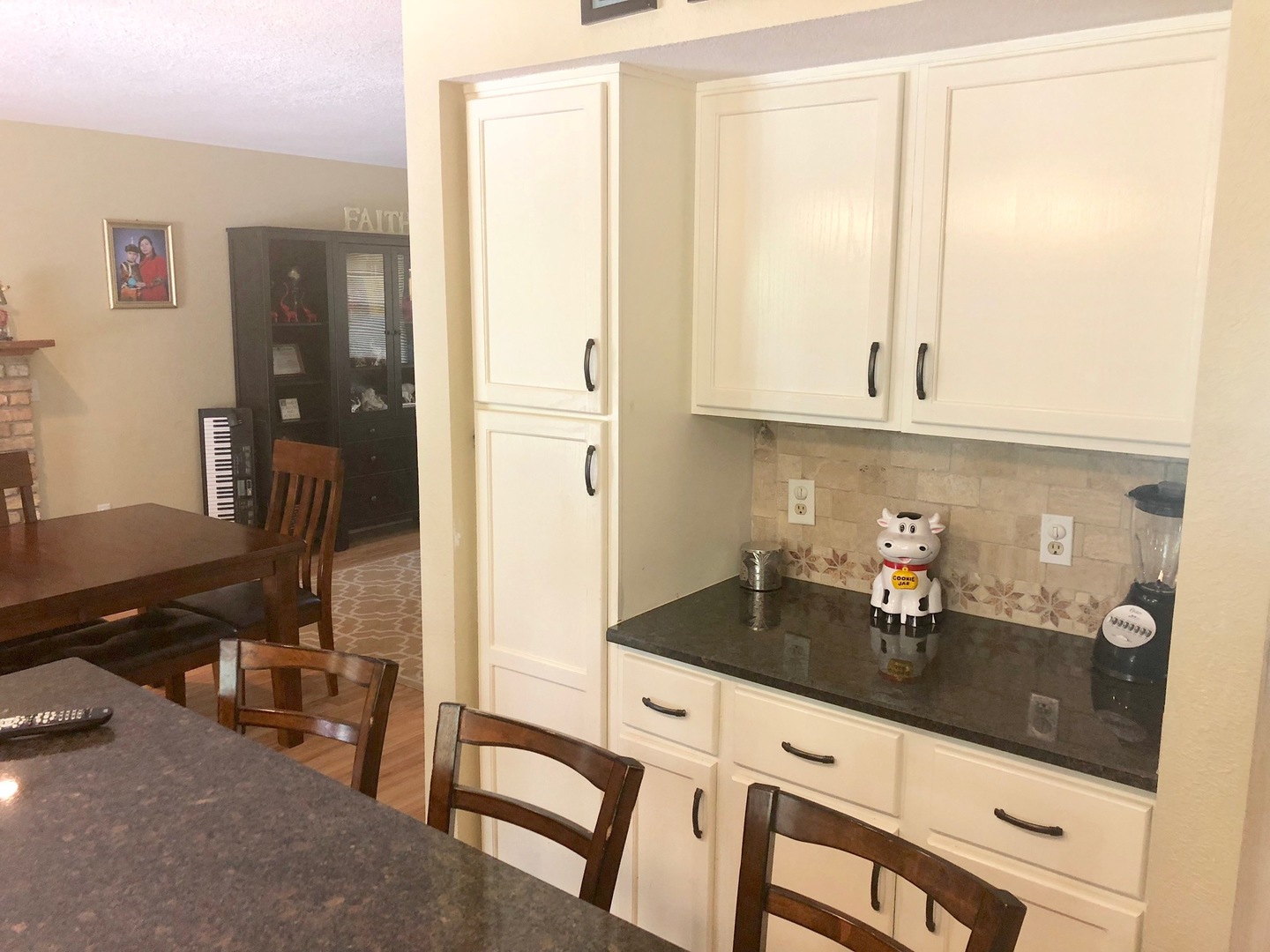 374 Rock Island Road Dixon, IL 61021 - Photo 3 of 20 a kitchen with granite countertop a sink and a stove top oven