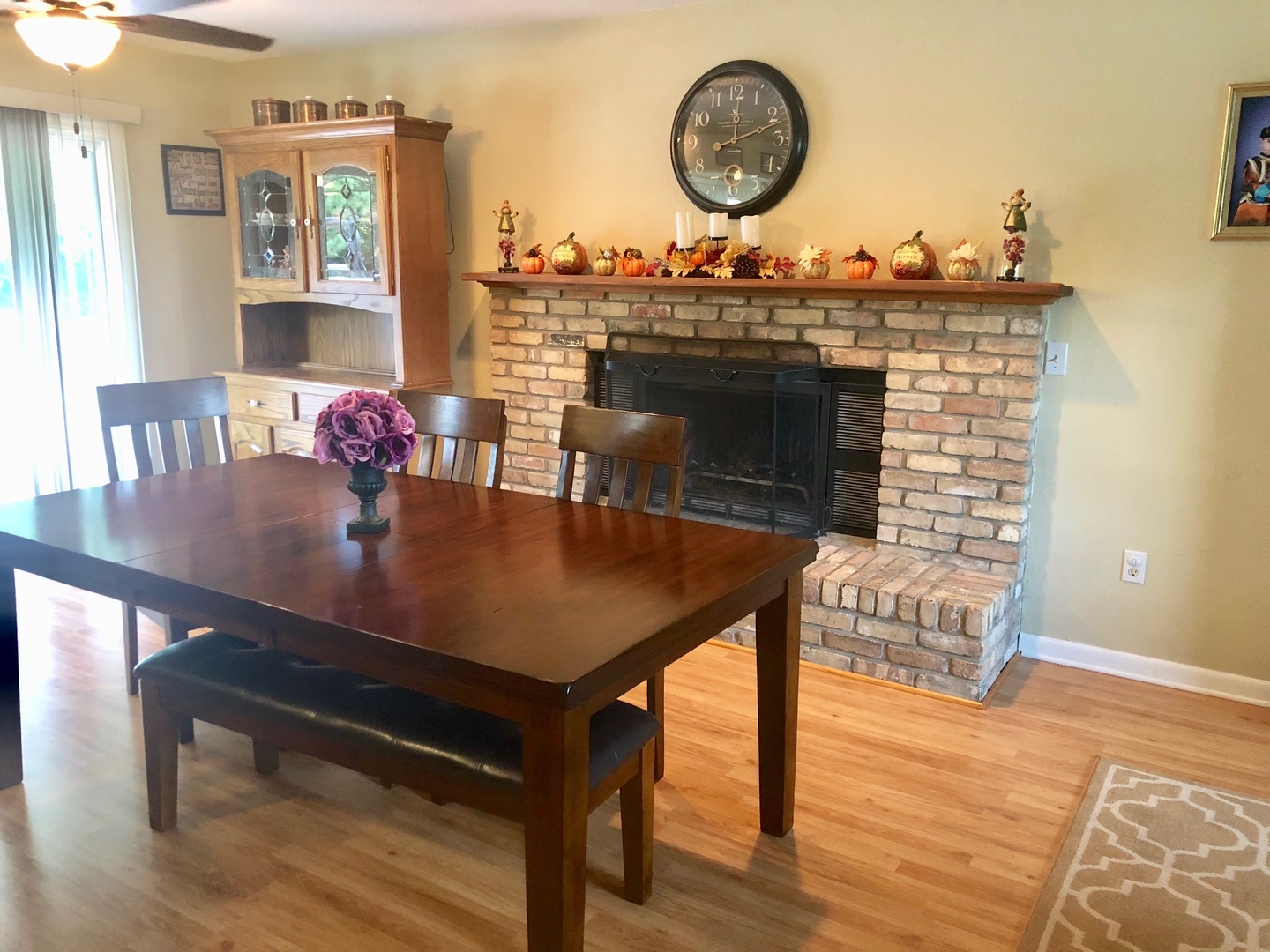374 Rock Island Road Dixon, IL 61021 - Photo 5 of 20 a view of a dining room with furniture and wooden floor