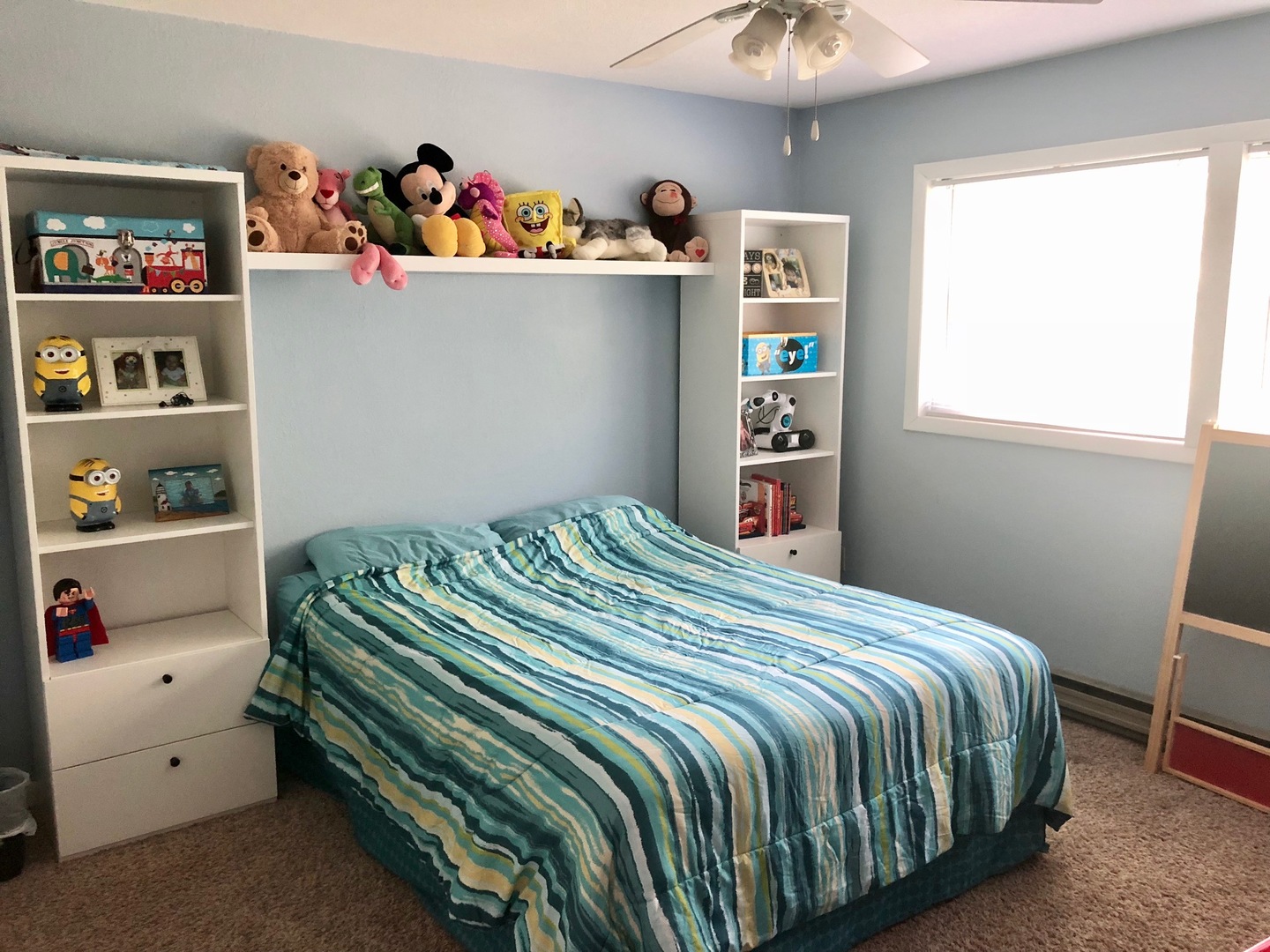 374 Rock Island Road Dixon, IL 61021 - Photo 10 of 20 a bedroom with a bed and a bookshelf