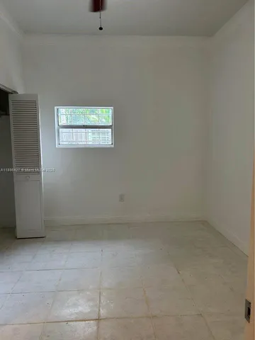 a bathroom with a toilet a sink and shower