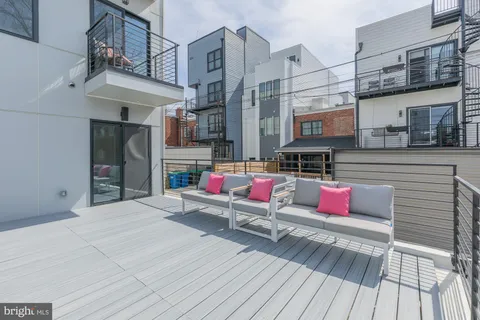 a building outdoor space with patio furniture