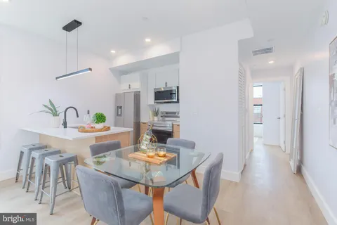 a view of a dining room with furniture
