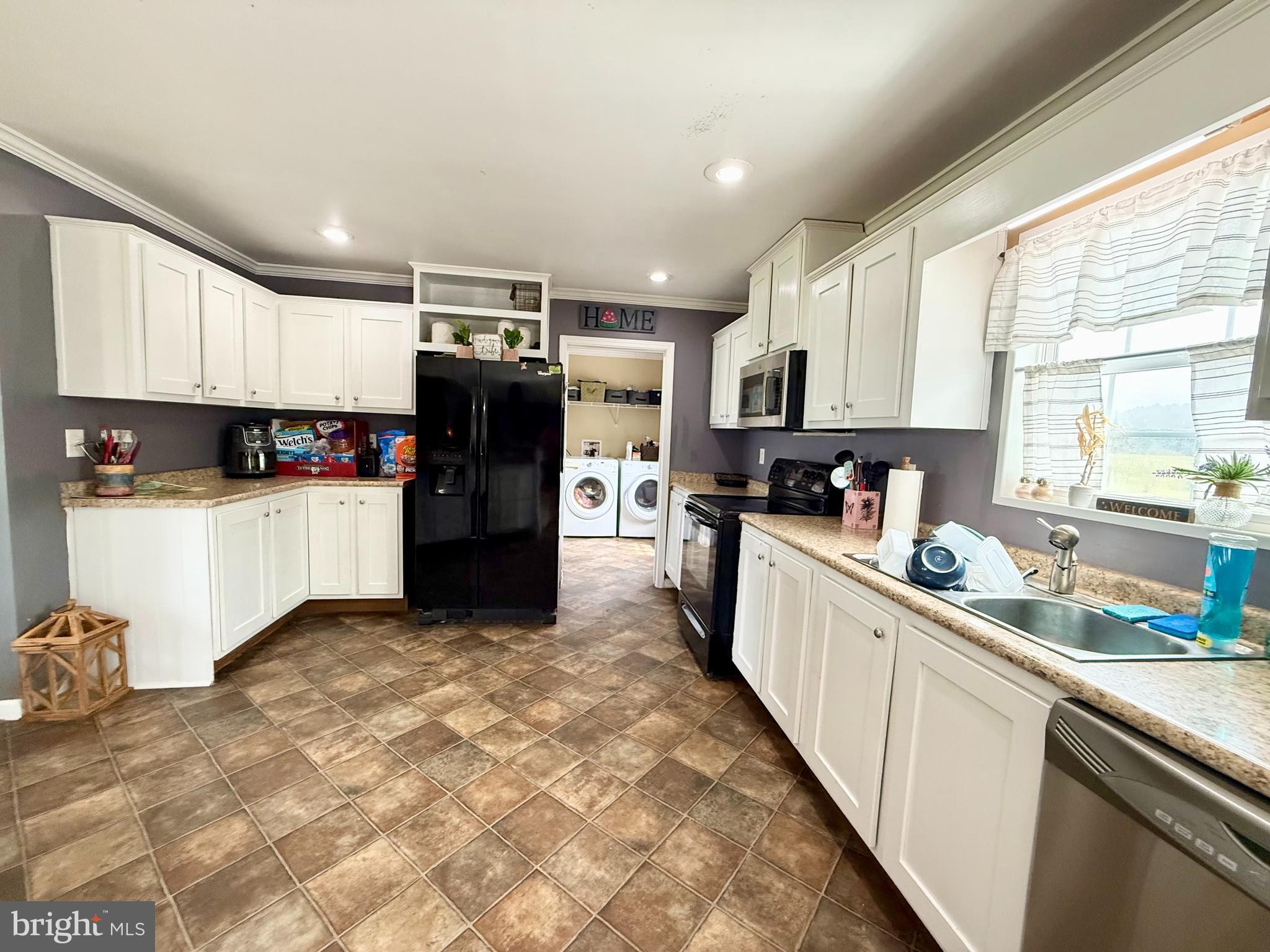 35777 Cobbs Hill Road Willards, MD 21874 - Photo 14 of 46 a large kitchen with stainless steel appliances granite countertop a refrigerator and a stove top oven