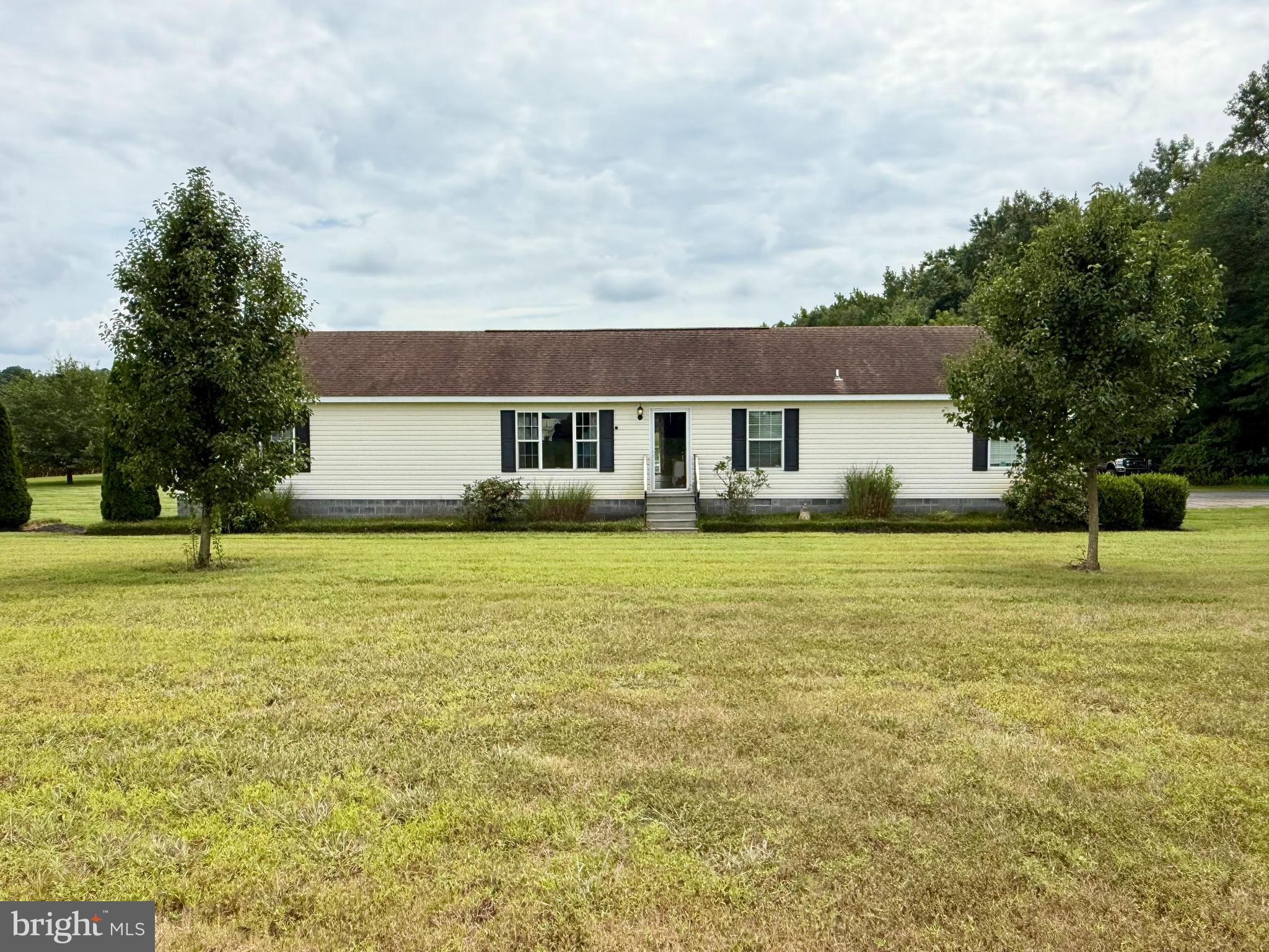 35777 Cobbs Hill Road Willards, MD 21874 - Photo 3 of 46 a front view of house with yard and trees