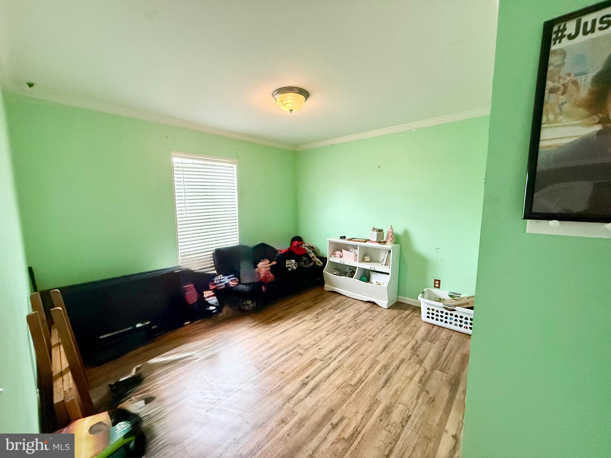 35777 Cobbs Hill Road Willards, MD 21874 - Photo 32 of 46 a living room with furniture and a flat screen tv