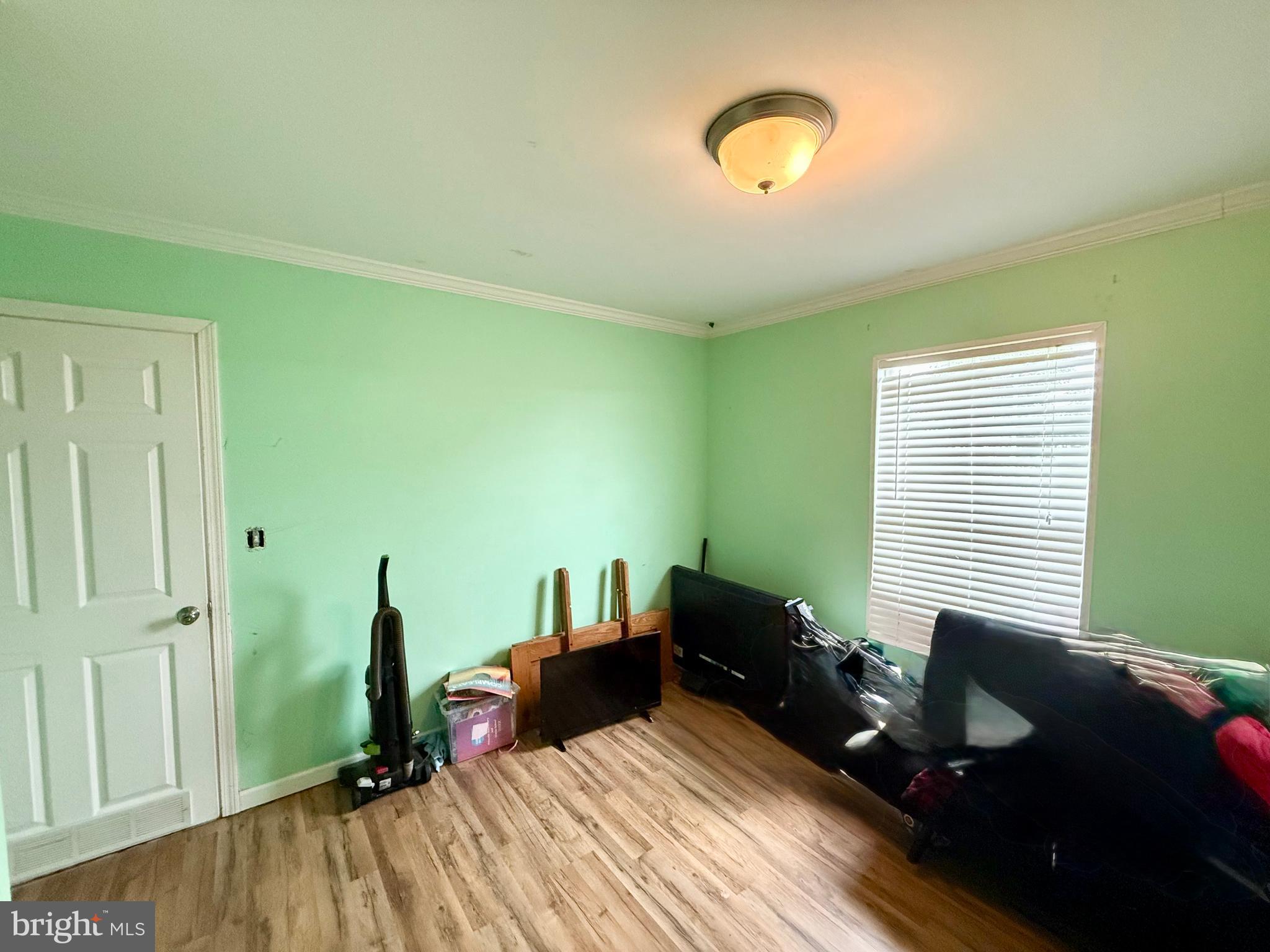 35777 Cobbs Hill Road Willards, MD 21874 - Photo 33 of 46 a bedroom with a bed and a window