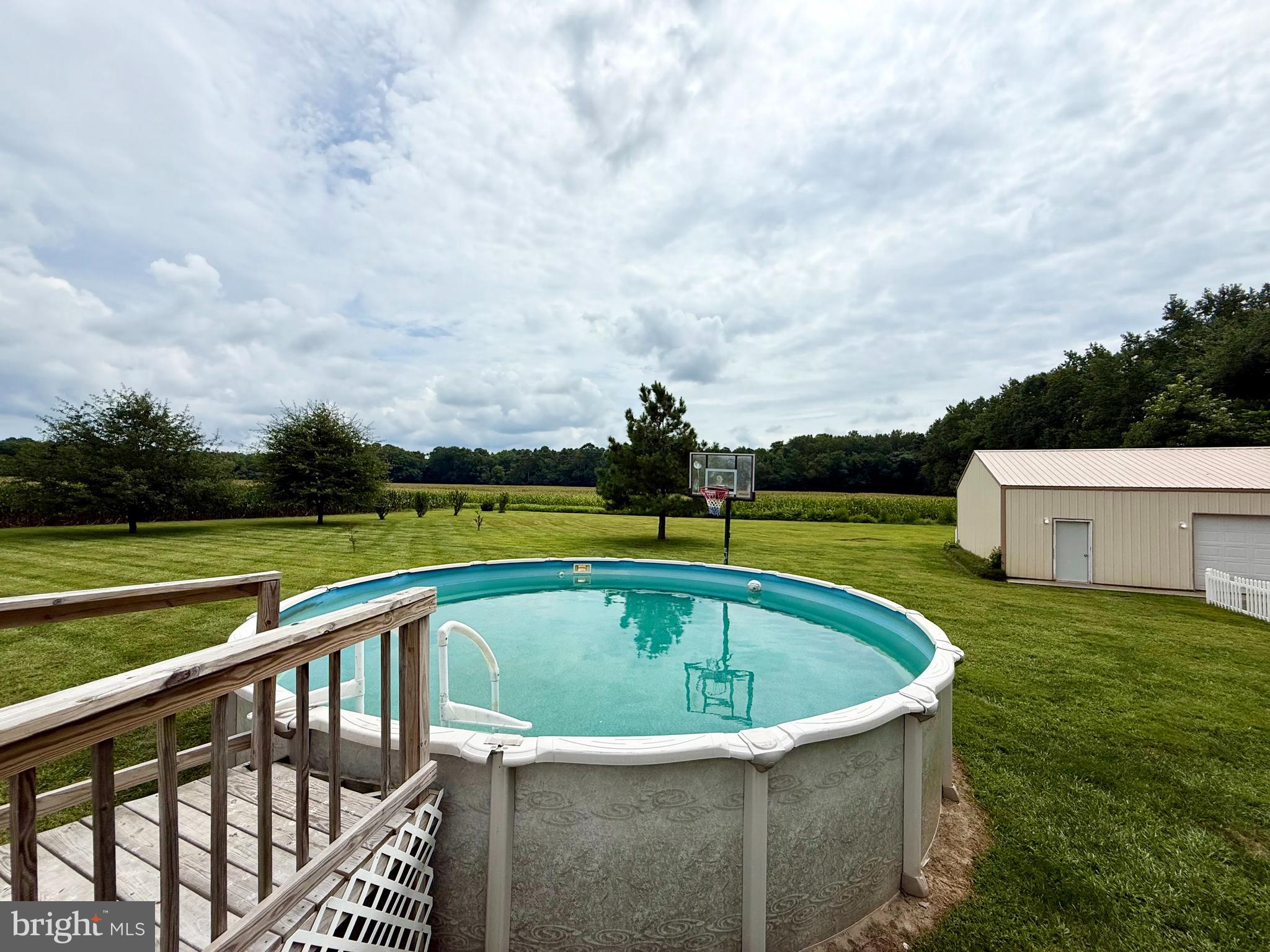 35777 Cobbs Hill Road Willards, MD 21874 - Photo 38 of 46 a view of a swimming pool and a yard