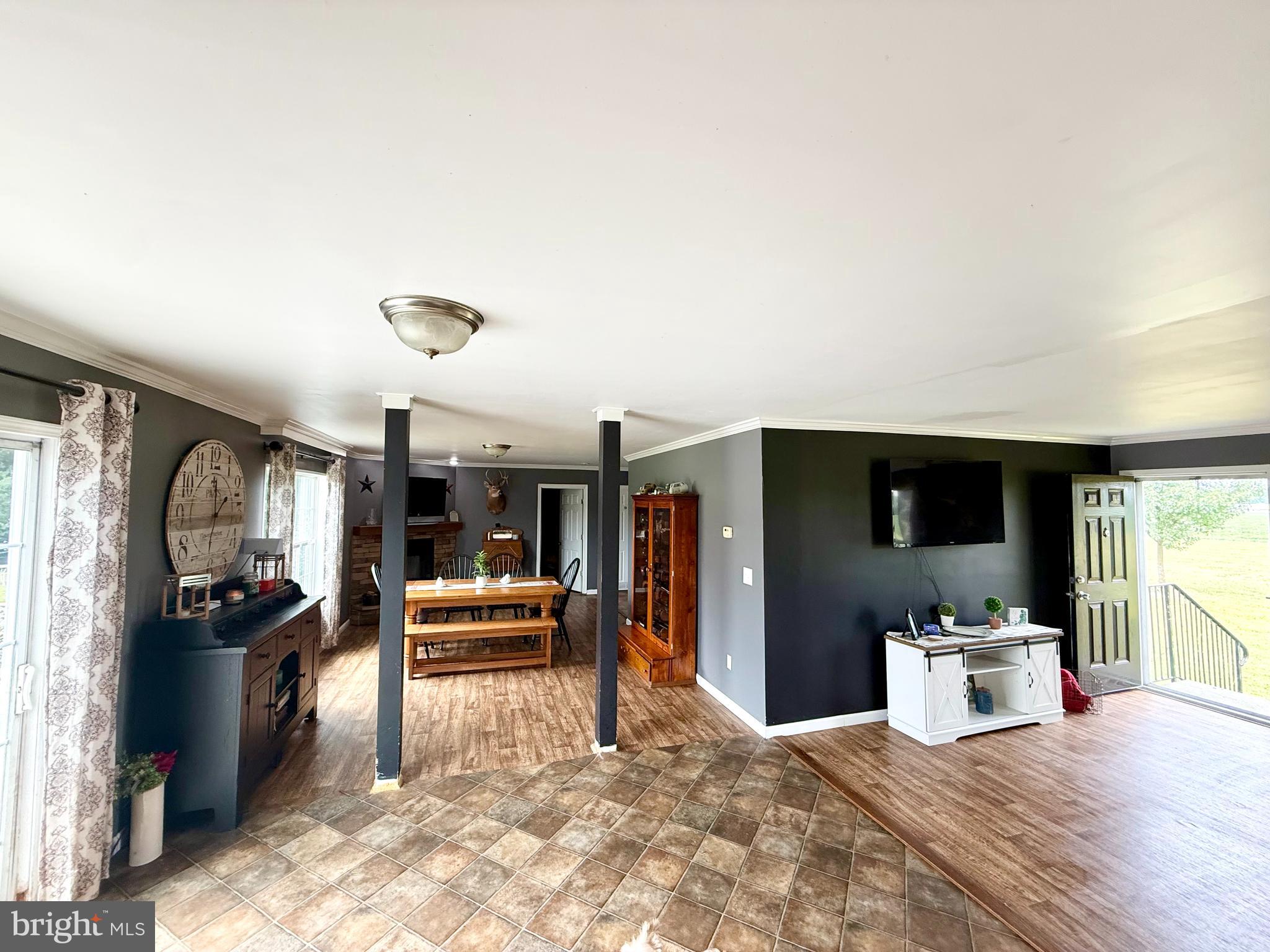 35777 Cobbs Hill Road Willards, MD 21874 - Photo 8 of 46 a living room with furniture and a flat screen tv