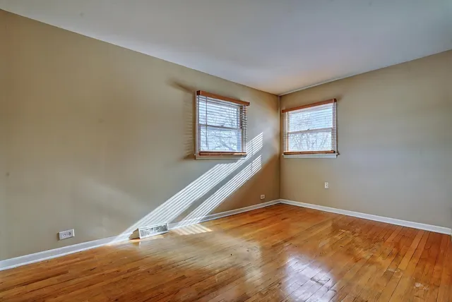 a bed room with a bed and a television