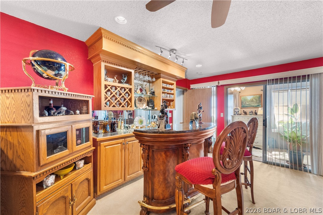 2264 Bittersweet Road Lake Ozark, MO 65049 - Photo 23 of 43 Bar and chairs do not stay