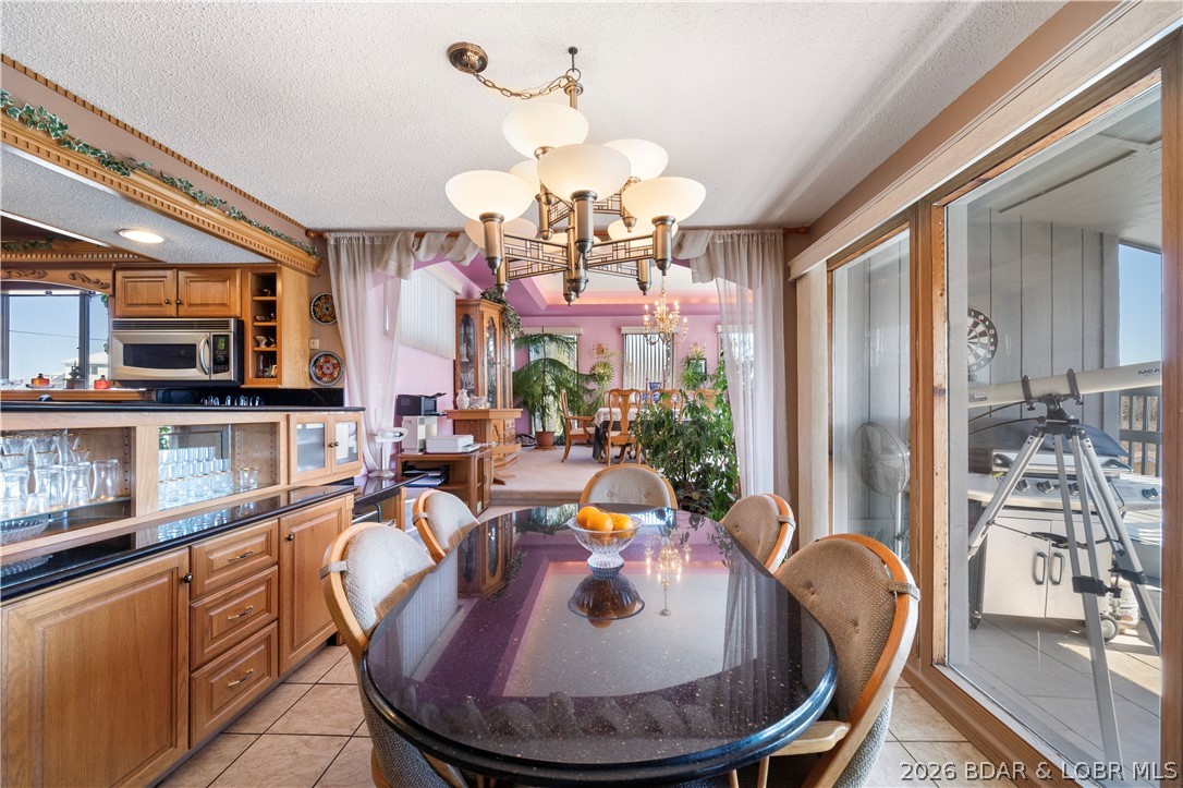 2264 Bittersweet Road Lake Ozark, MO 65049 - Photo 6 of 43 Extra cabinets in the dining area