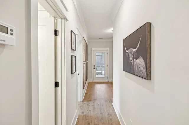 a bedroom with a bed and a ceiling fan