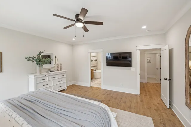 a bathroom with a shower and a glass door