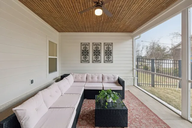 a view of a park with sitting area