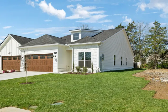 a view of a hallway with white walls