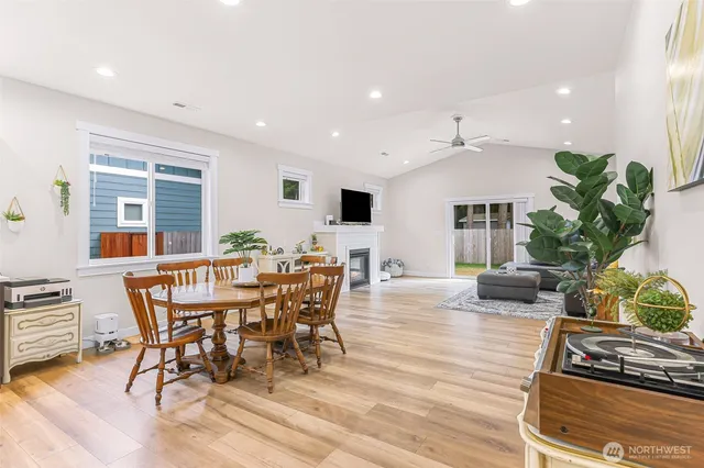 a view of a dining room with furniture window and wooden floor