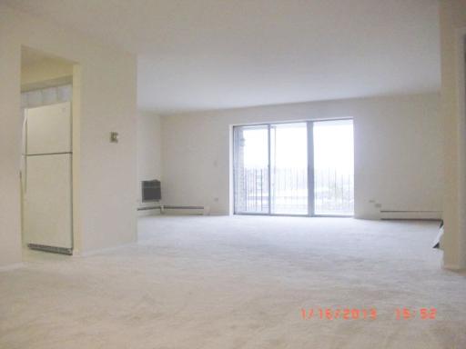 10353 Dearlove Road, Unit 5A Glenview, IL 60025 - Photo 2 of 9 an empty room with windows