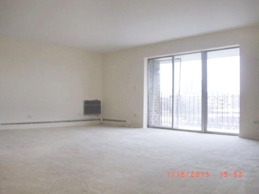 10353 Dearlove Road, Unit 5A Glenview, IL 60025 - Photo 3 of 9 a view of an empty room with a window