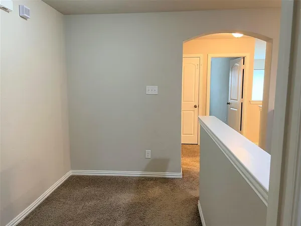 a view of an entryway and a hallway
