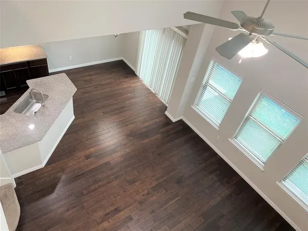 wooden floor in a hall with an entryway
