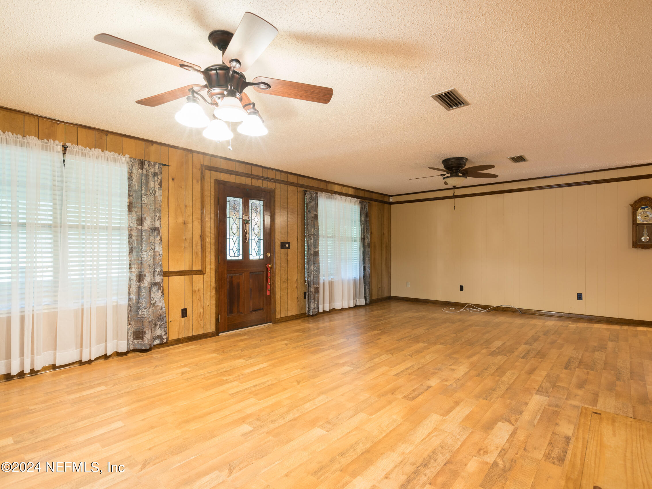 27278 Inspiration Way Hilliard, FL 32046 - Photo 13 of 25 a view of an empty room with a window