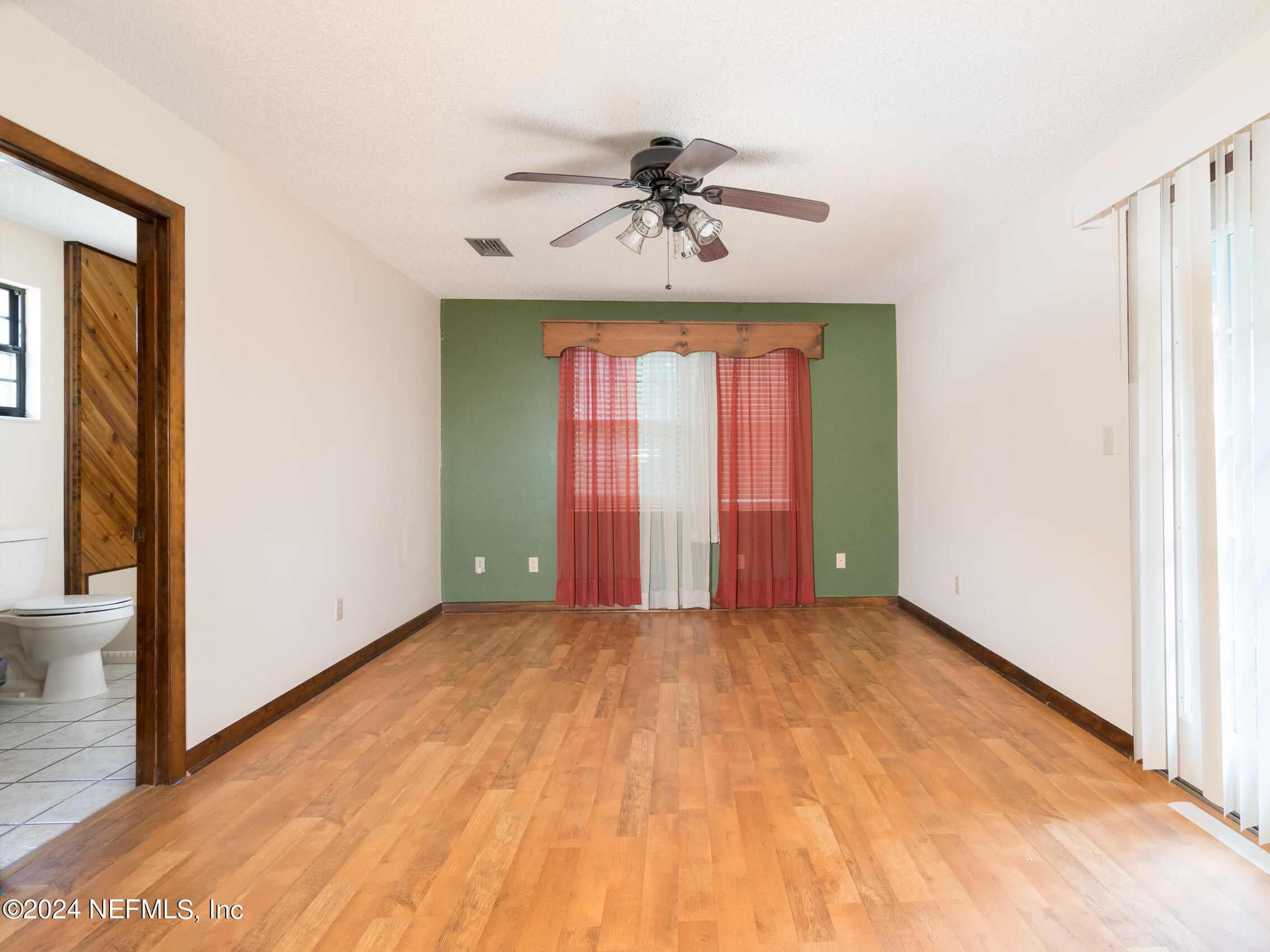 27278 Inspiration Way Hilliard, FL 32046 - Photo 15 of 25 a view of an empty room with a window