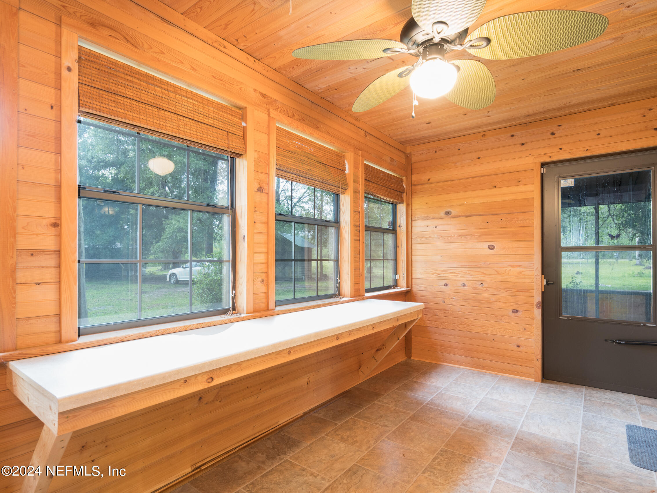 27278 Inspiration Way Hilliard, FL 32046 - Photo 20 of 25 a view of room with a ceiling fan and window