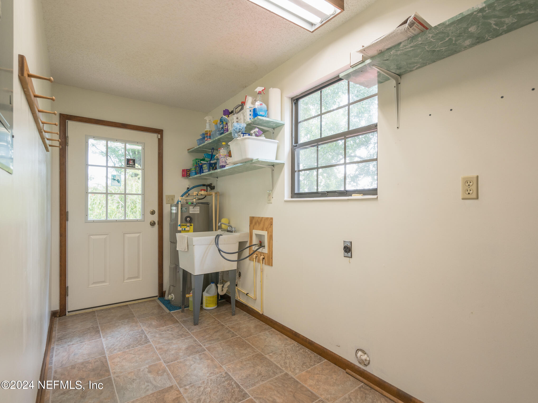27278 Inspiration Way Hilliard, FL 32046 - Photo 21 of 25 a view of a room with windows