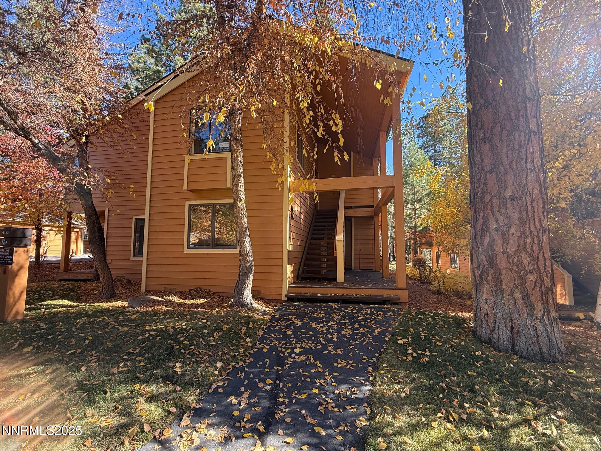 939 Incline Way, Unit 195 Incline Village, NV 89451 - Photo 3 of 17 a view of a house with a yard