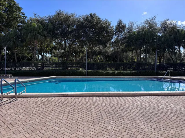 a view of a building with backyard