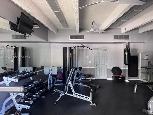 a view of a room with gym equipment
