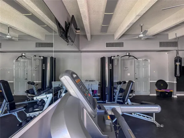 a view of a room with gym equipment
