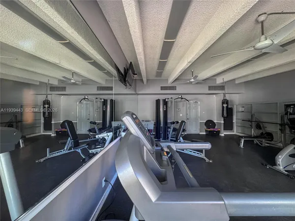 a view of a room with gym equipment