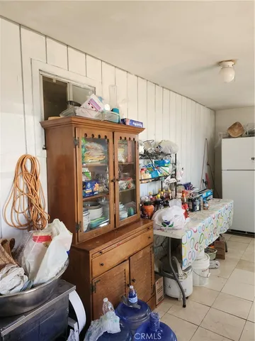 a view of a yard covered with snow