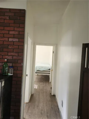 a view of hallway with washer and dryer