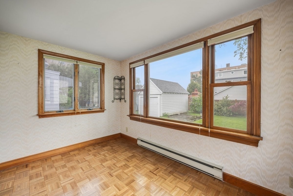 18 Bates Road Arlington, MA 02474 - Photo 13 of 42 a view of an empty room with a window