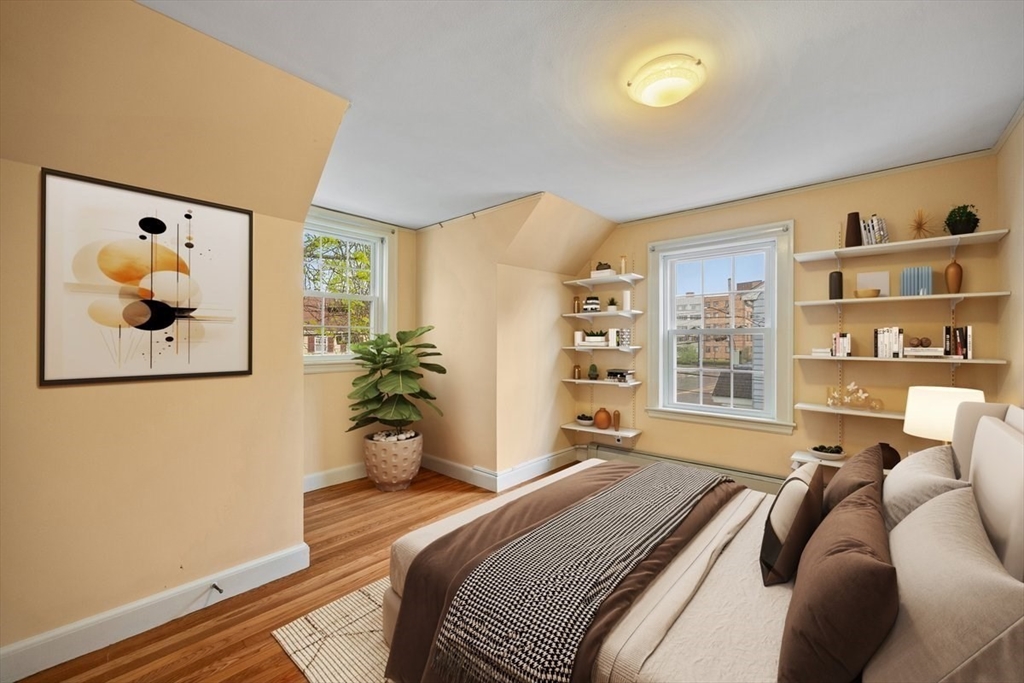 18 Bates Road Arlington, MA 02474 - Photo 20 of 42 a bedroom with a bed furniture and a window