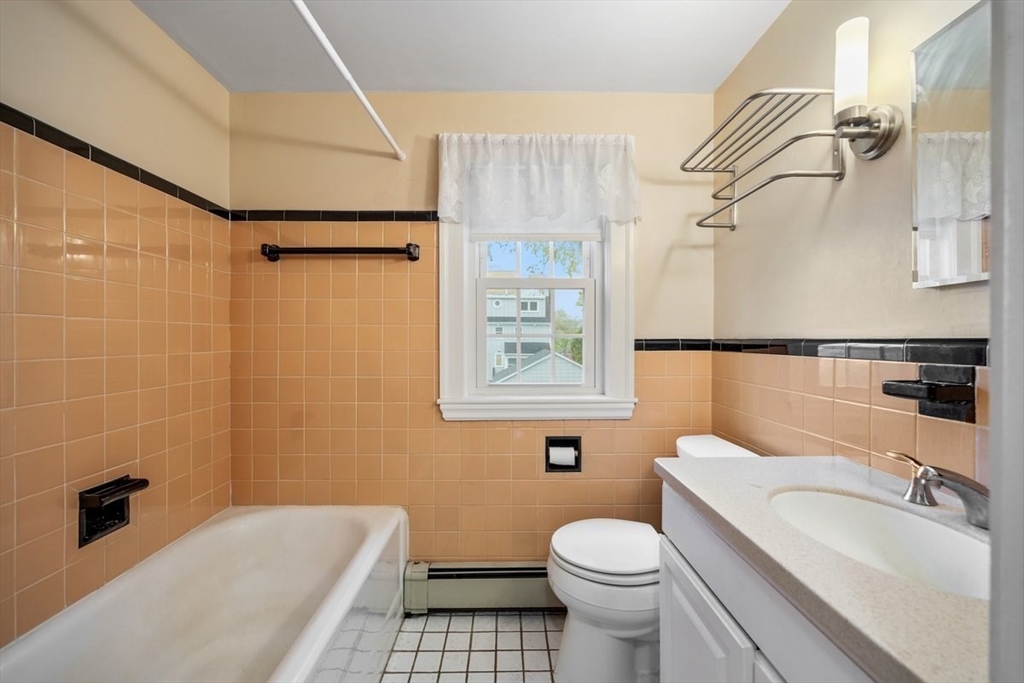 18 Bates Road Arlington, MA 02474 - Photo 27 of 42 a bathroom with a sink toilet and shower