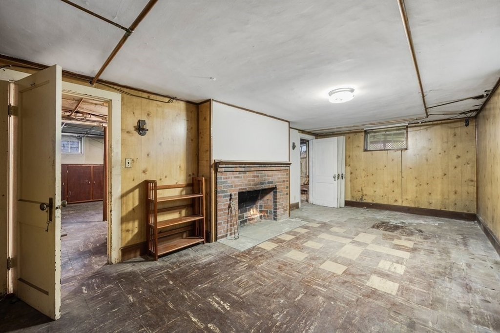 18 Bates Road Arlington, MA 02474 - Photo 28 of 42 a view of a livingroom with a fireplace