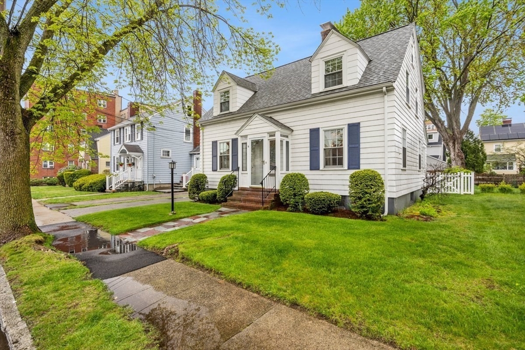 18 Bates Road Arlington, MA 02474 - Photo 32 of 42 a view of a house with backyard