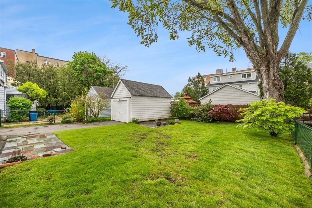 18 Bates Road Arlington, MA 02474 - Photo 35 of 42 a front view of a house with garden