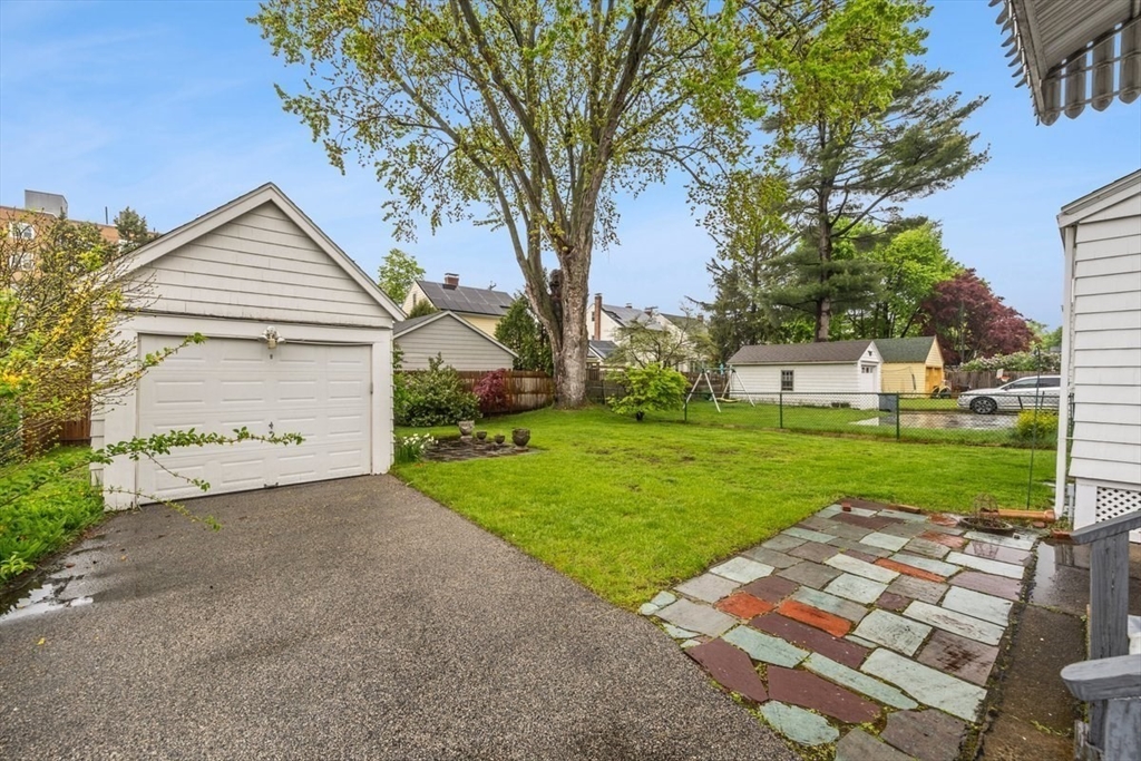 18 Bates Road Arlington, MA 02474 - Photo 37 of 42 front view of a house with a yard
