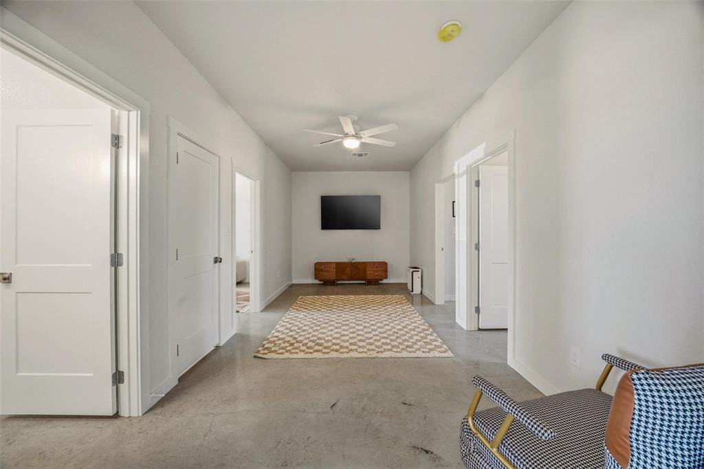 1525 North Bosley Road Santo, TX 76472 - Photo 21 of 40 a view of a livingroom with a flat screen tv