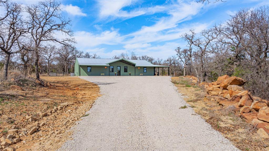 1525 North Bosley Road Santo, TX 76472 - Photo 36 of 40 a view of swimming pool with a yard