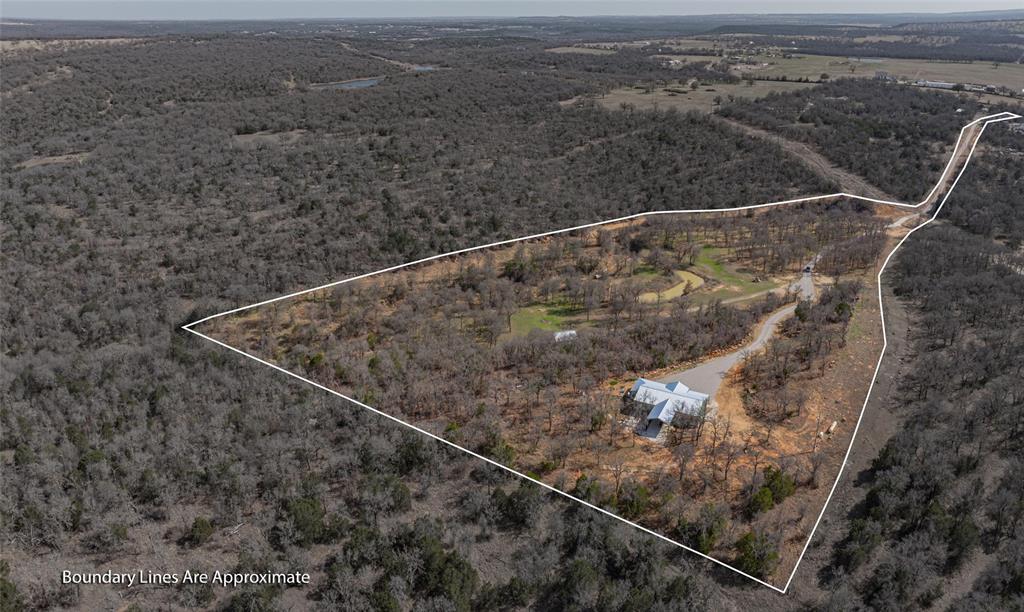 1525 North Bosley Road Santo, TX 76472 - Photo 37 of 40 a view of balcony with wooden floor