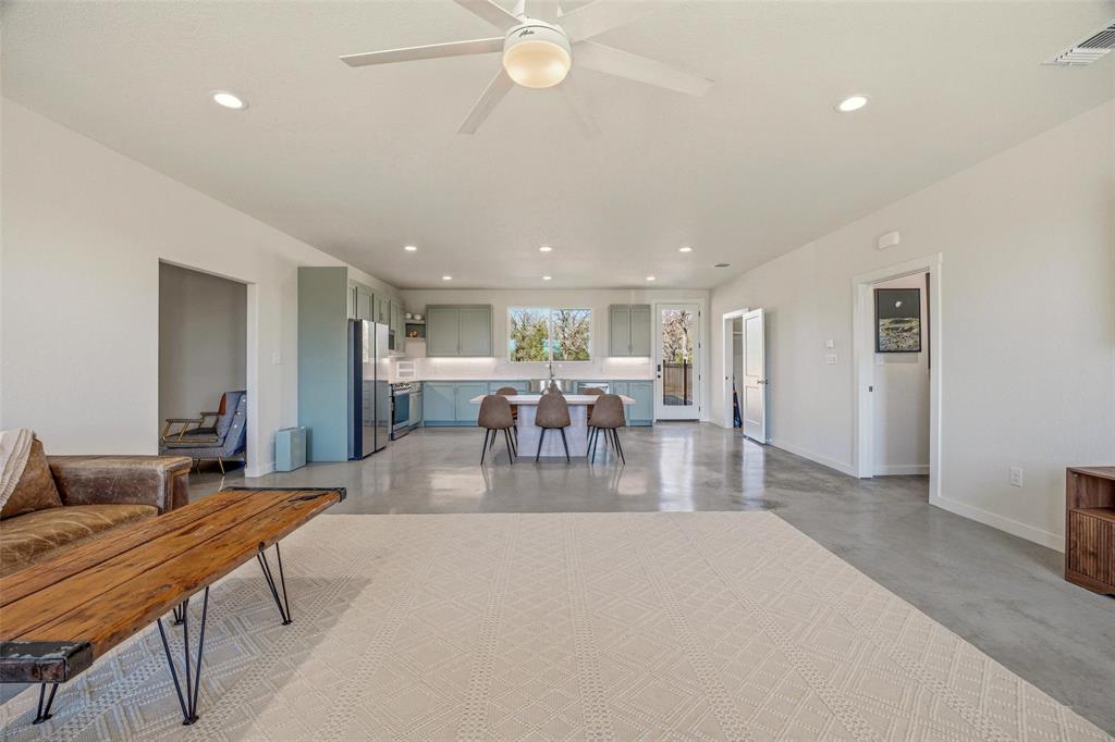 1525 North Bosley Road Santo, TX 76472 - Photo 6 of 40 a dining room with furniture and a view of kitchen